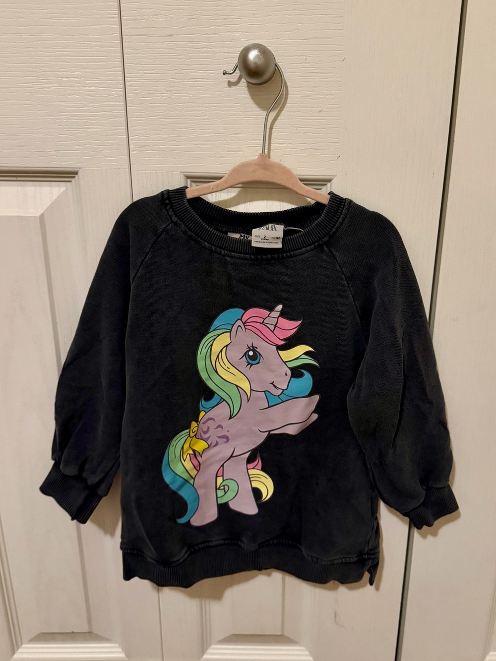Zara Black Sweatshirt with Pastel Rainbow Pony Graphic